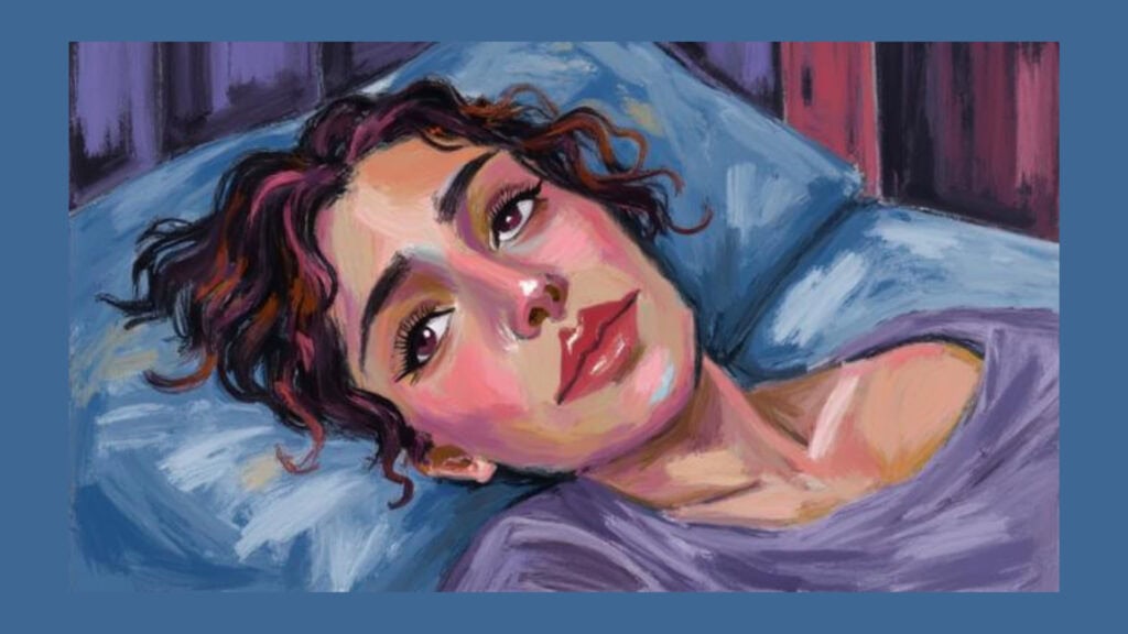 Person lying awake at night after waking at 3am