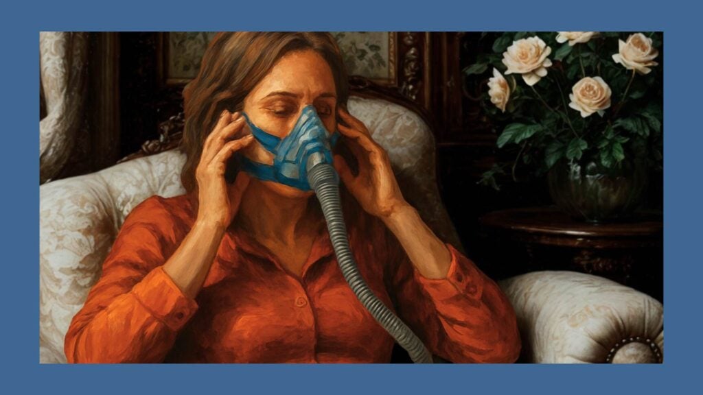 Woman practising wearing a CPAP mask during the day to get used to sleep apnoea treatment.
